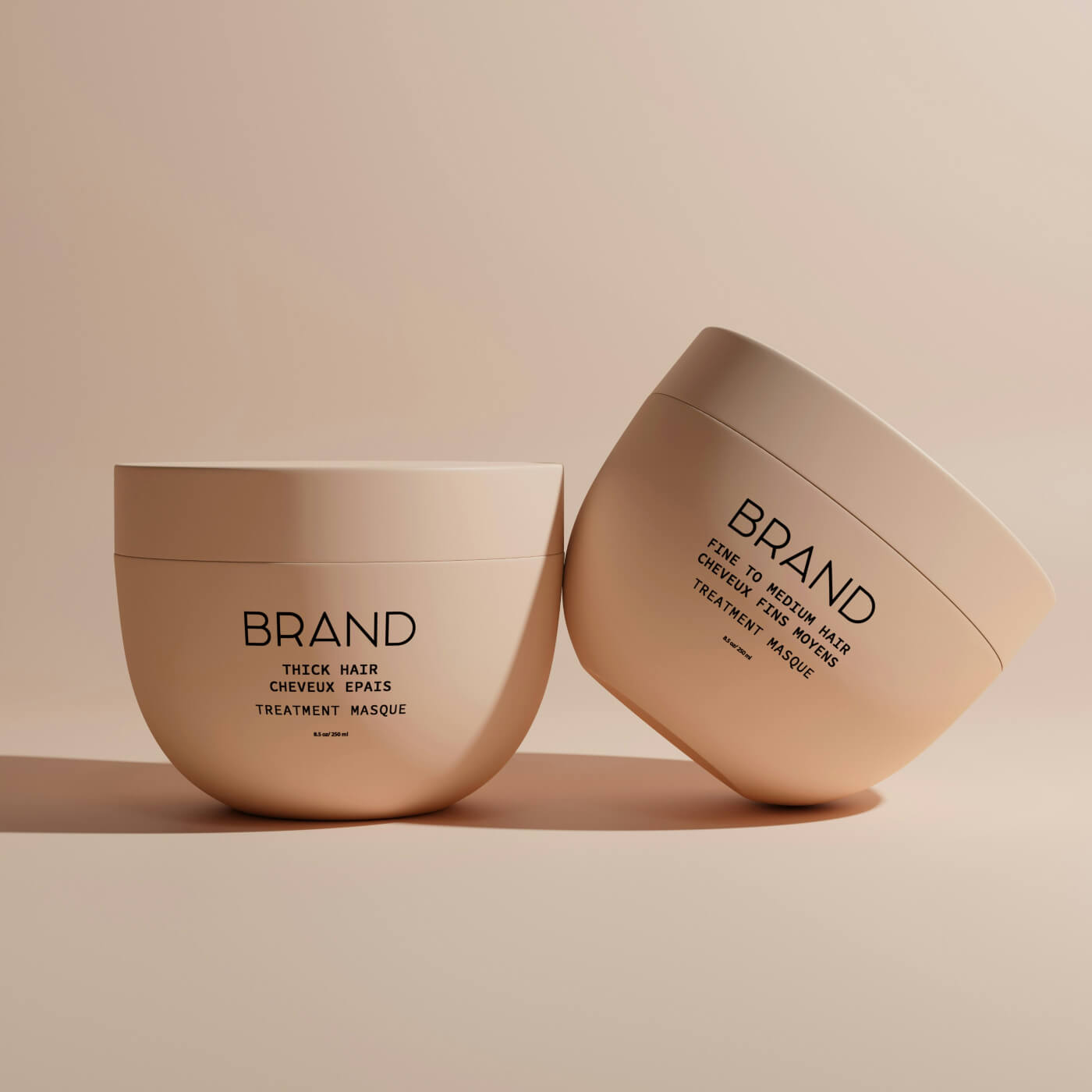 Two beige hair treatment containers labeled for thick and fine to medium hair.