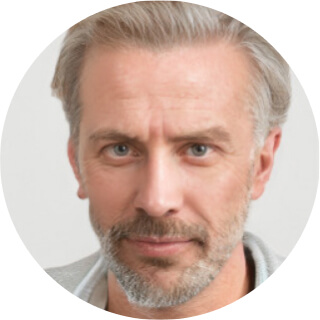 Portrait of a middle-aged man with gray hair and beard.